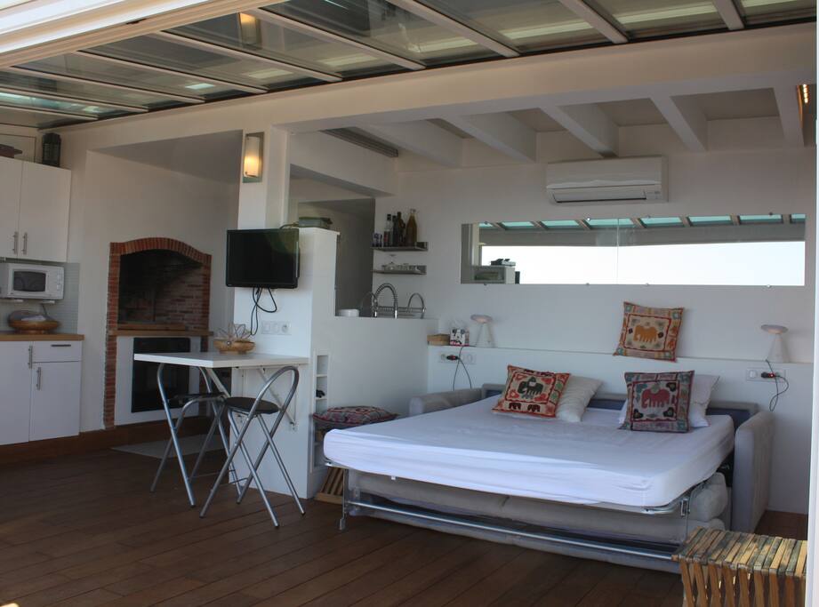 living space with comfortable sofa bed