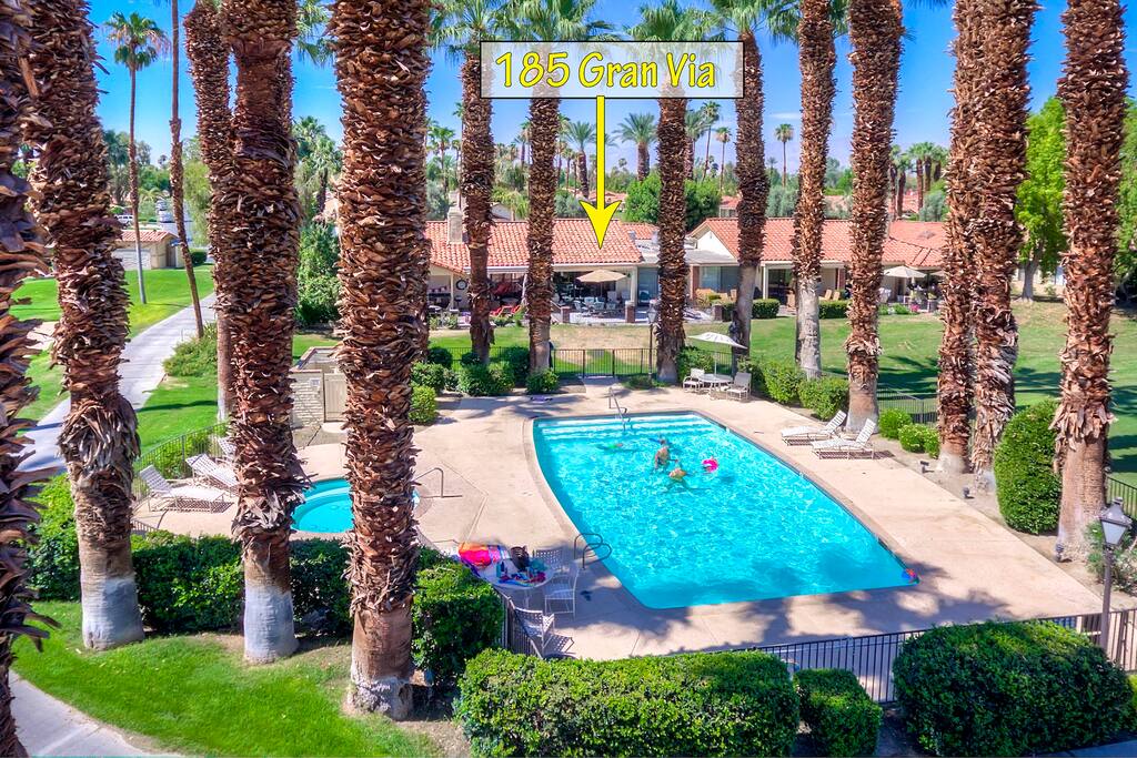 Aerial photo of South back patio steps to the pool and spa! Resort beach towels furnished