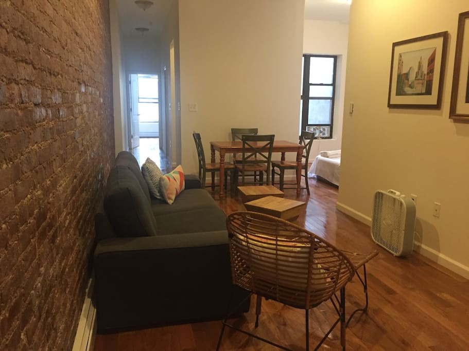 Living/dining areas and a den room with raised air mattress