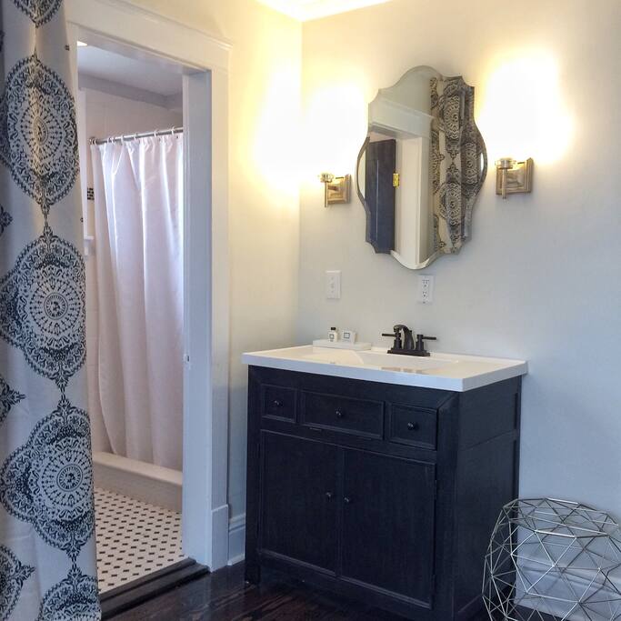 The toilet and shower are separated from the sink in the main living area, making it convenient for two to get ready at the same time.