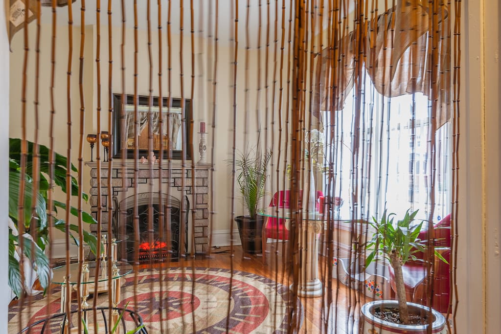 Living room with bamboo strings from the 1970’s as dividers.