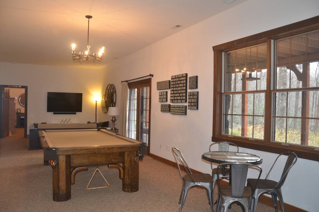 Relax while playing pool and watching the 70" tv