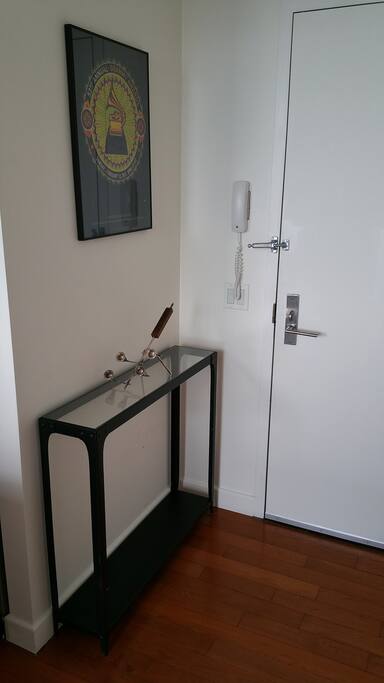 Entry way table and Grammy memorabilia