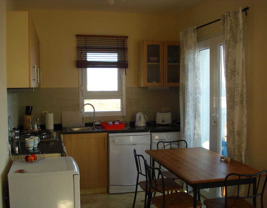 Kitchen and dining area includes everything you need