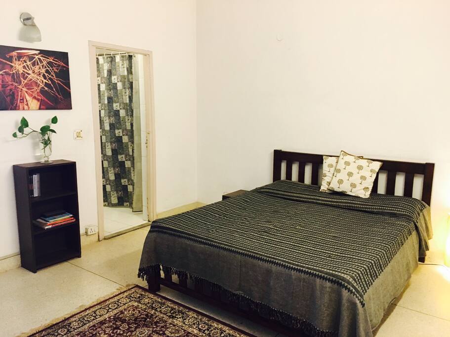 Bedroom with attached bathroom and study