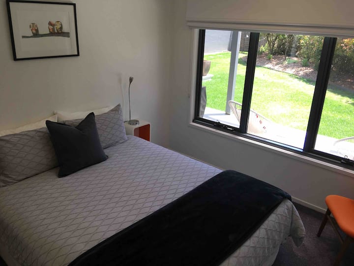 Spacious queen size bed, ceiling fan, heater and beautiful outlook to garden.