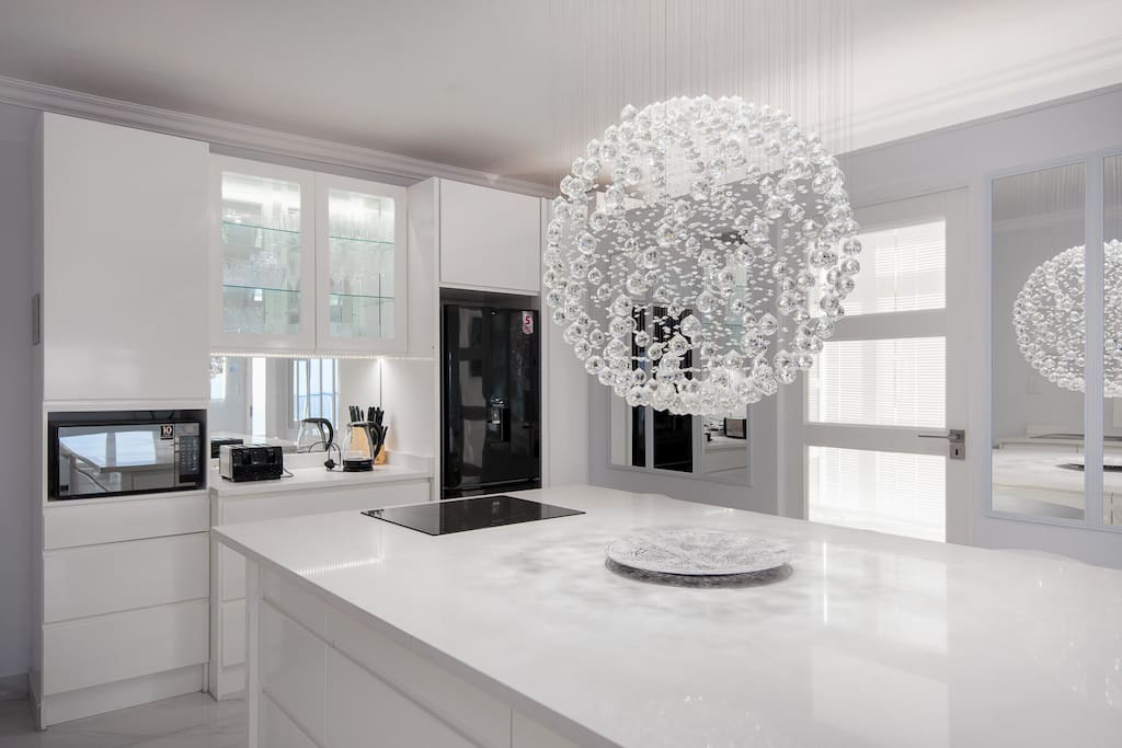 Fully equipped open plan kitchen with modern features