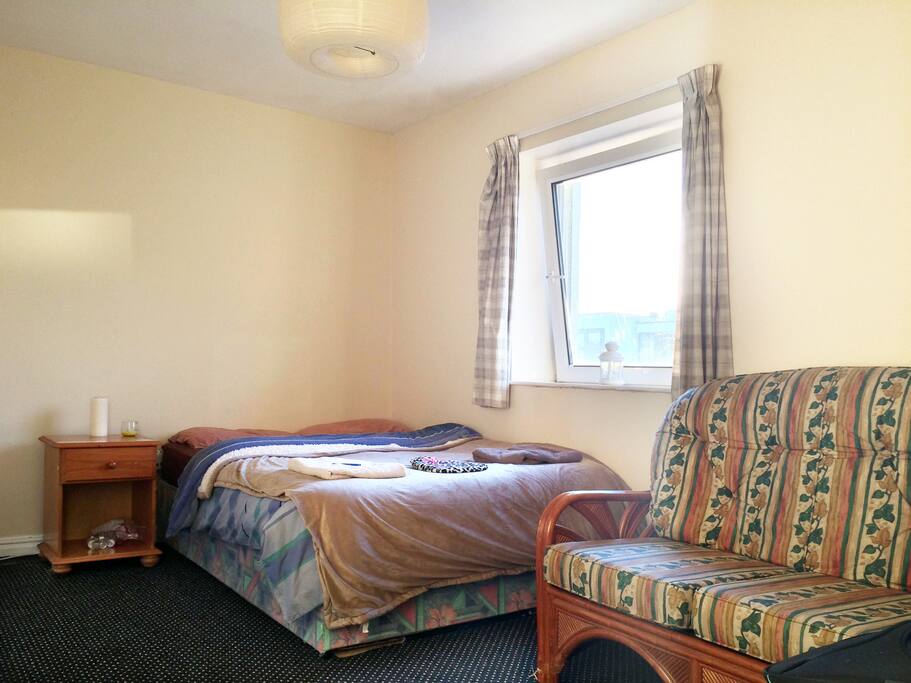 A room with a double bed, and an optional air mattress that will be provided for 3 guests upon an early request