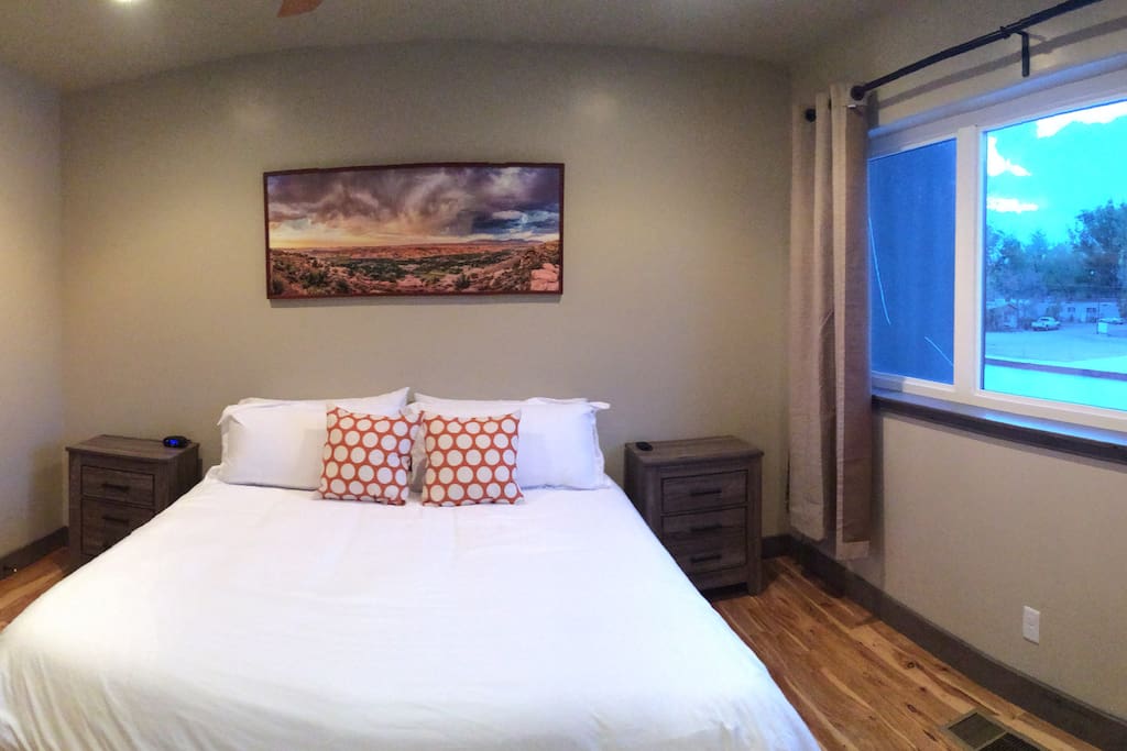 Master Bedroom Suite. King Bed, Flat Screen TV, Walk in Closet, Hardwood Floors.