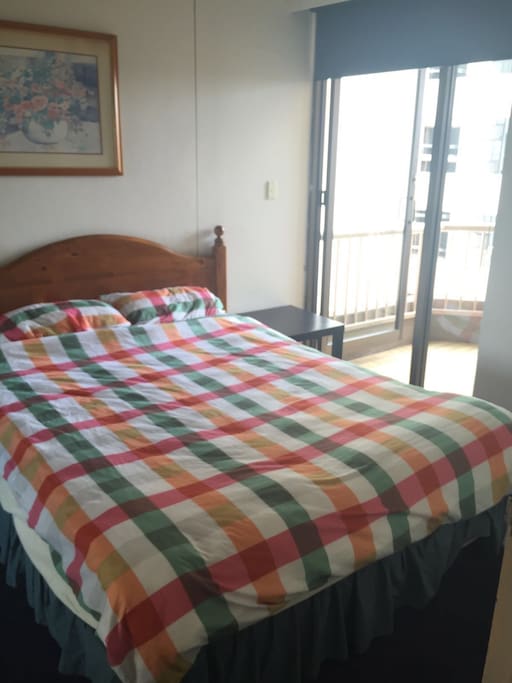 Bedroom with balcony.