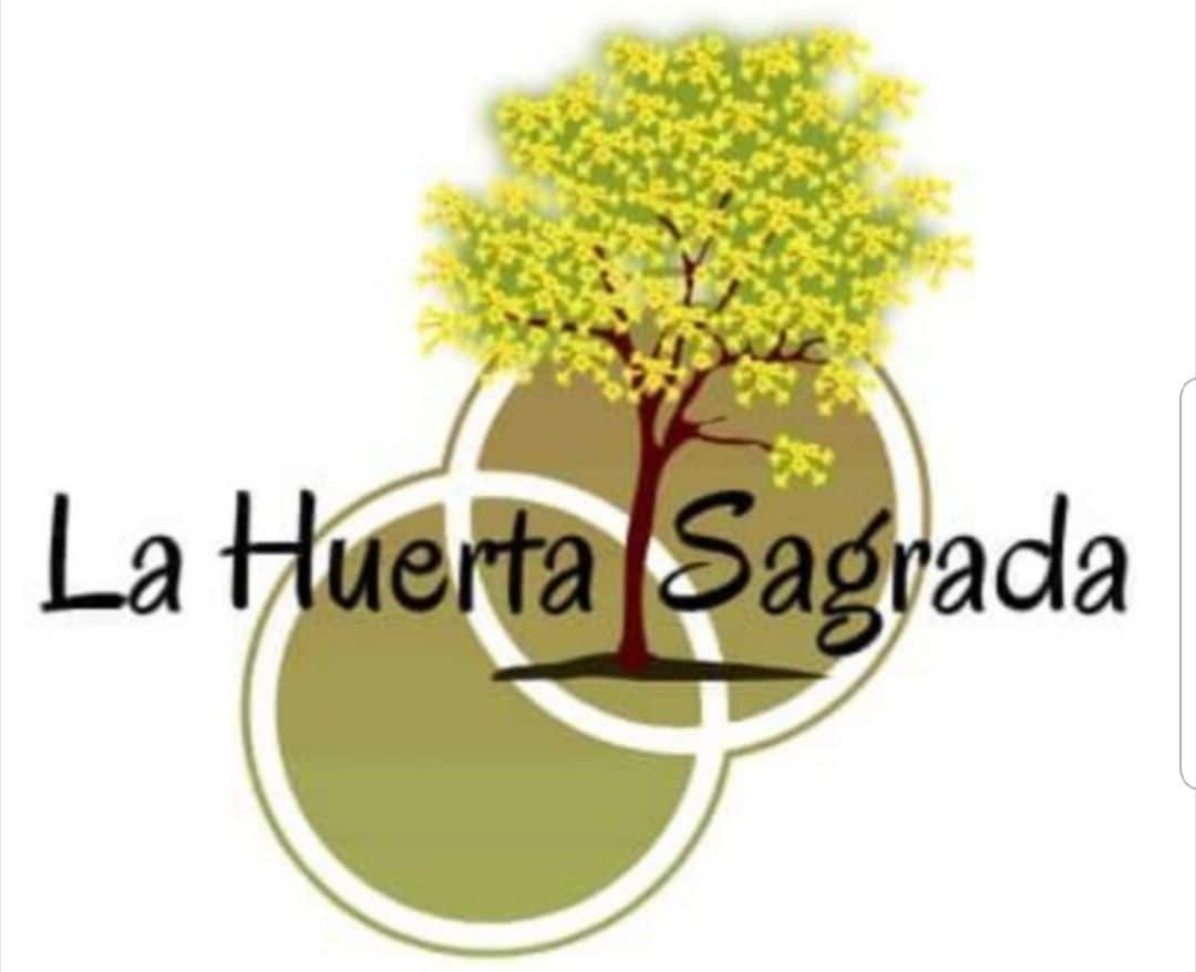 A logo is displayed featuring a prominent tree with bright yellow leaves. The design includes three overlapping circles in varying shades of green and beige. The text 'La Huerta Sagrada' is positioned beneath the tree, presented in a simple, welcoming font.