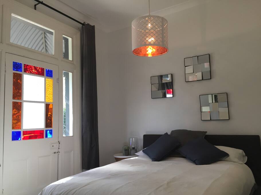 Second bedroom with Queen bed, balcony and built-in robes
