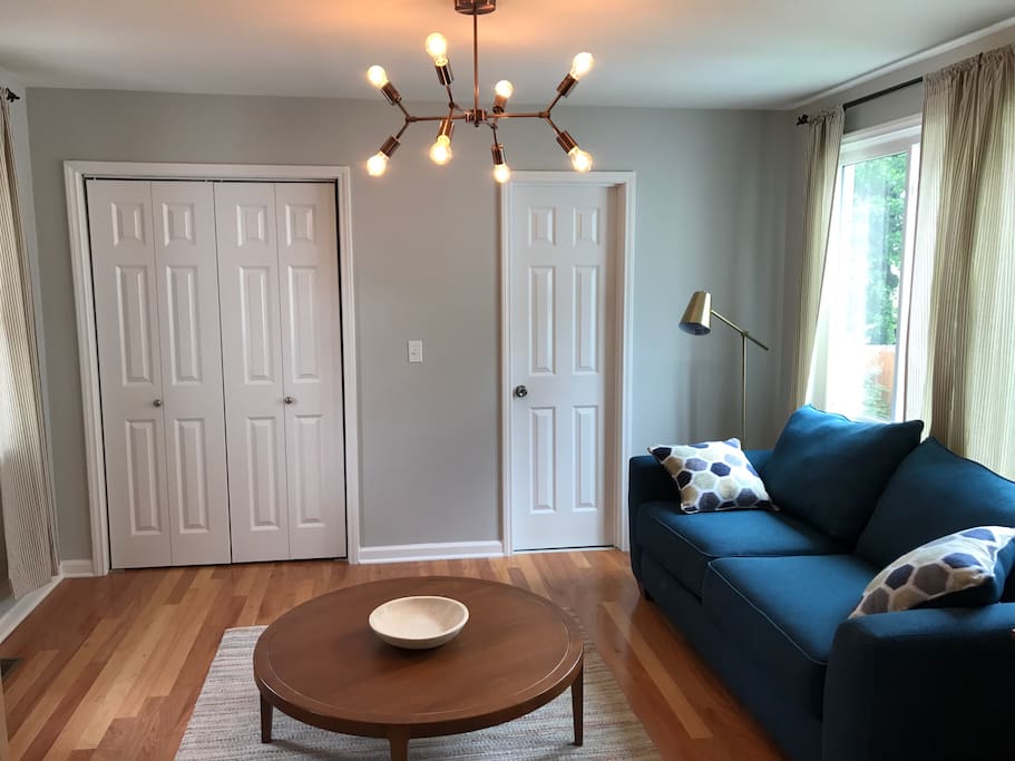 Den with full-sized sleeper sofa. Bathroom and Laundry room there too.