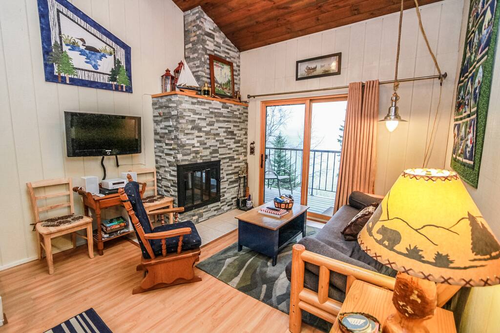 Beautifully updated stone fireplace.