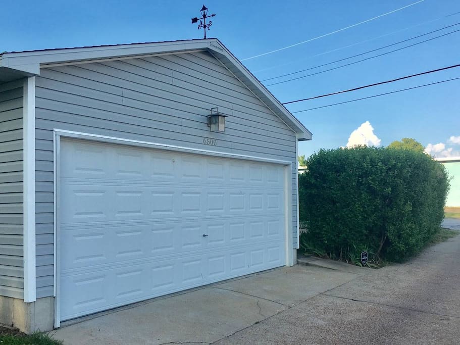 Remote operated garage space available off alley w/ convenient side door keypad entry