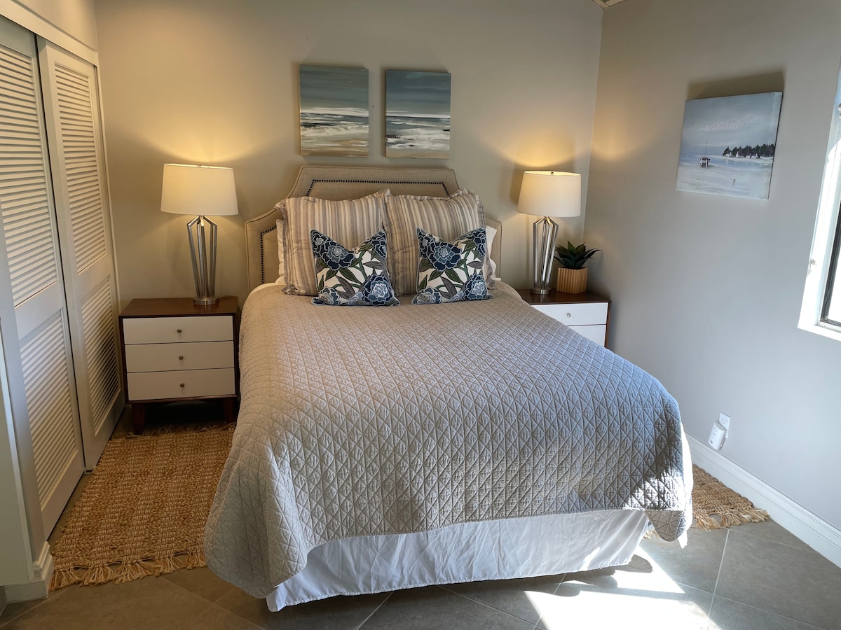 Vistas al campo de golf desde la cama tamaño queen