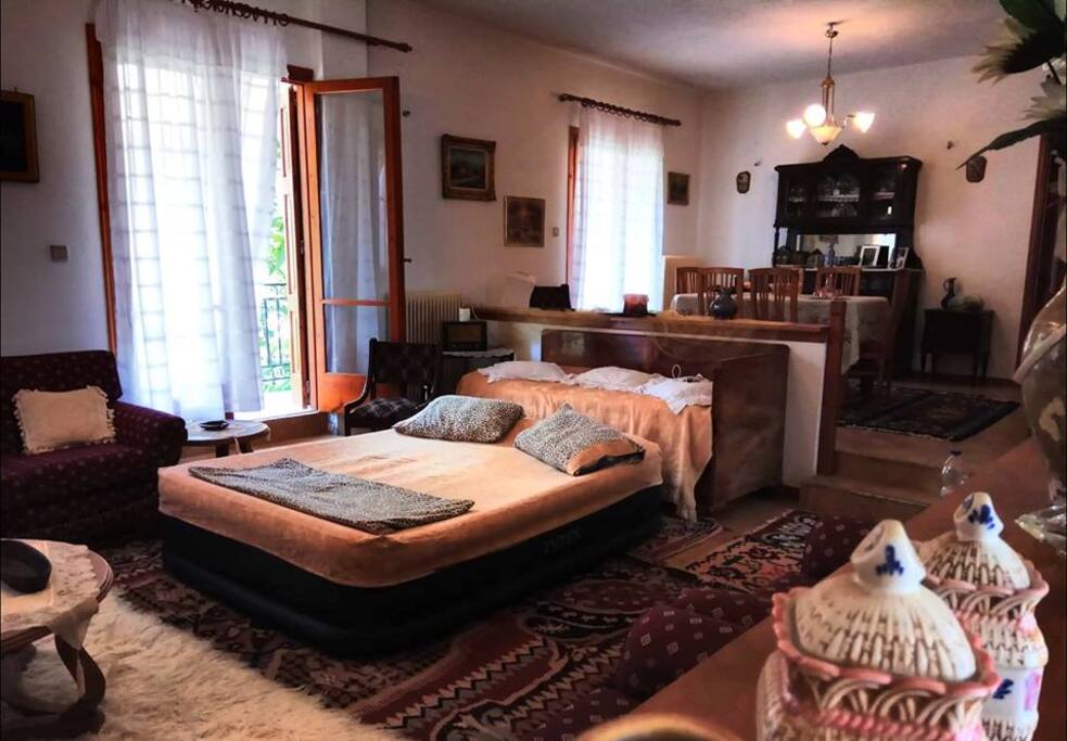 Living room with dinning room (with double inflatable portable bed).