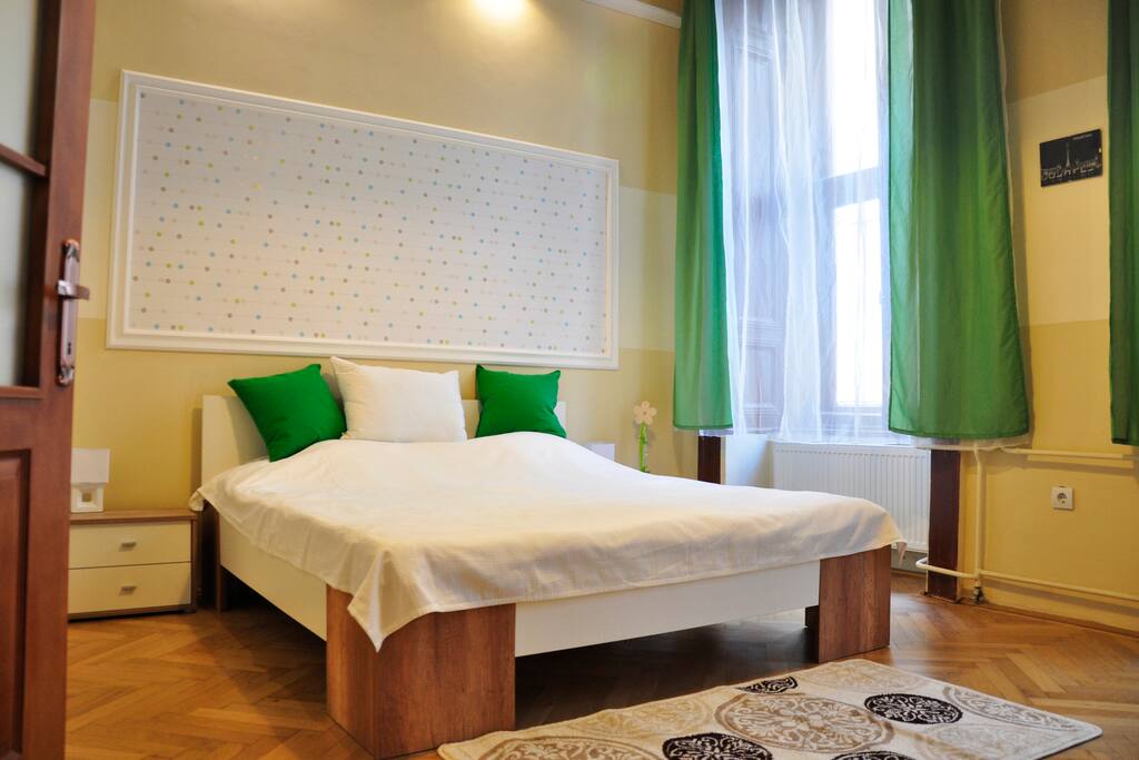 Larger bedroom with queen size bed
