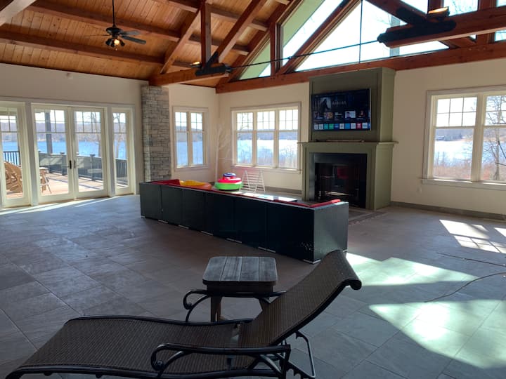 Our spa area has amazing views of Gardner Lake. A great place to relax  and watch TV and sit by our gas fireplace. There are 2 decks off of our spa room with amazing views of the water.