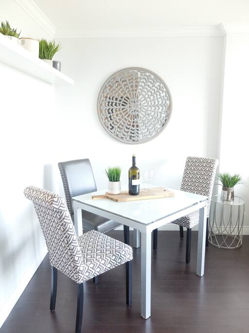 Dining Nook with 3 chairs off to the side of the living area. Table can be expanded if necessary.