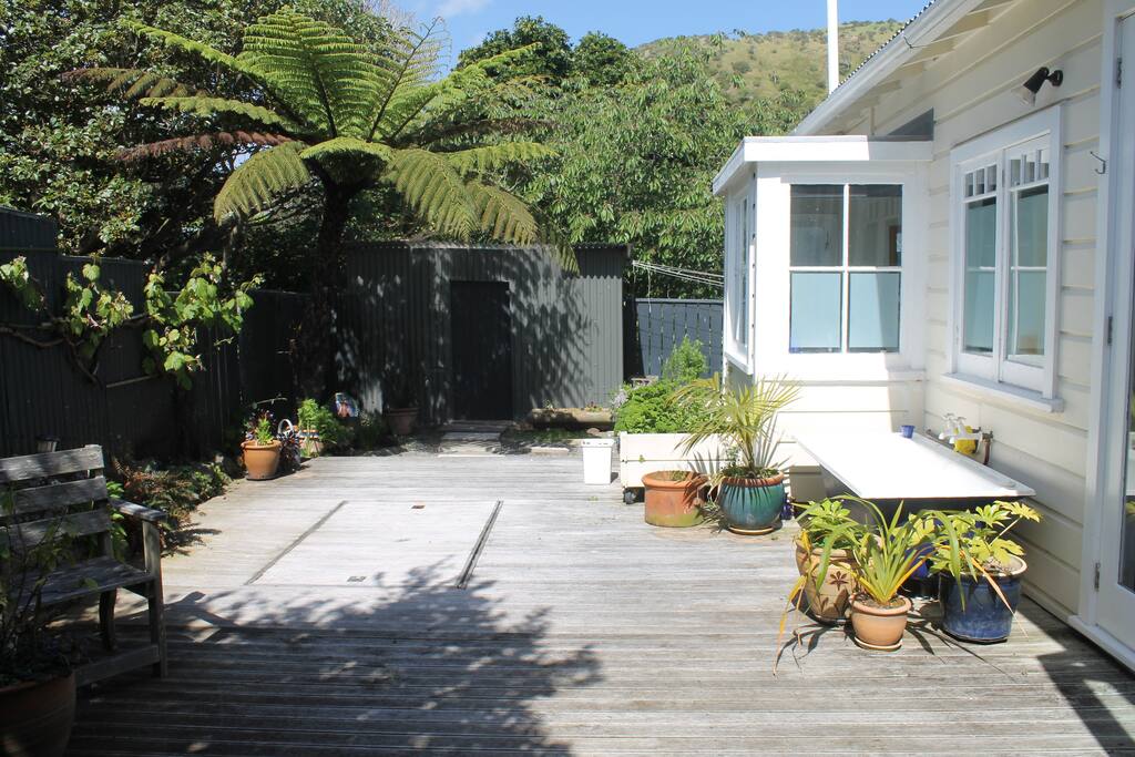 Private and sunny deck at the back of the house. perfect for breakfast in the morning, or for an outdoor bath at night.