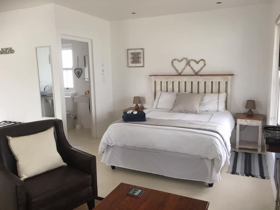 Spacious bedroom area with en suite bathroom
