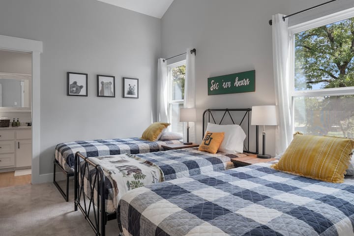 3 twin beds. Located upstairs. Shared full bath with bedroom 2.