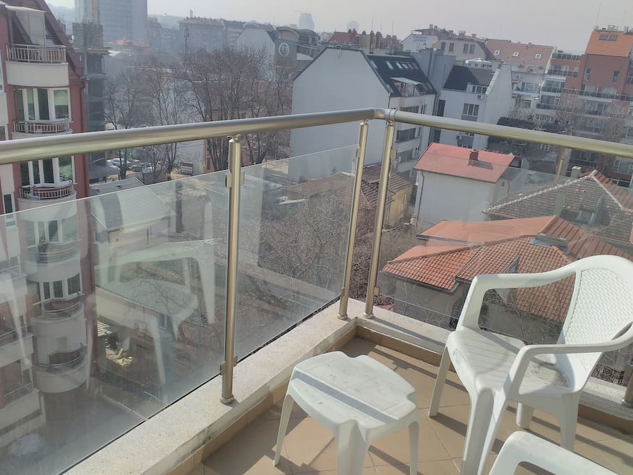 You have 2 chairs and a little table on one of the balconies to enjoy coffee/tea