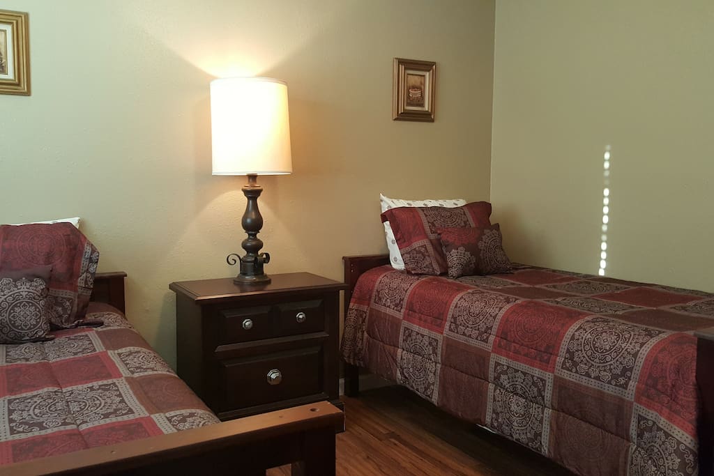 Two TwinXL beds with a pillow-top mattress