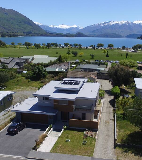 The inn from the air showing the lake and mtn views