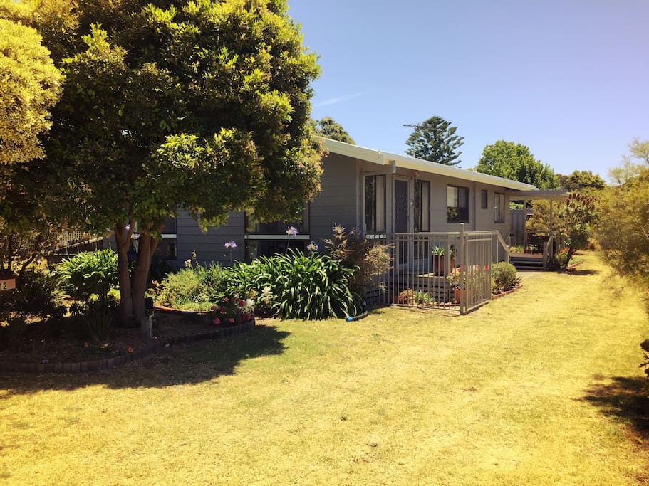 The house is set in a lovely expansive garden...