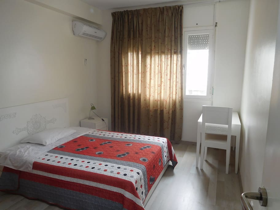 Mid-size Single Room: Double Bed, Desk, closet, A/C, cleaning 2x/week, Breakfast