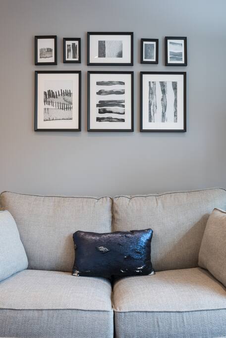 Light spacious living area with comfy sofa bed