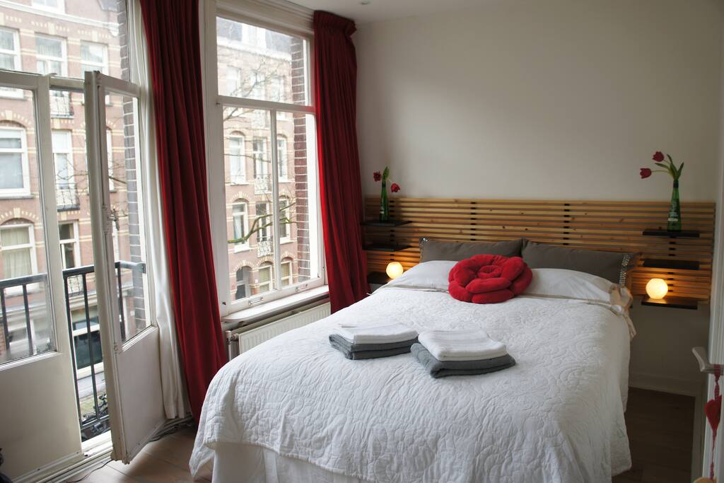Fresh light bedroom...close the curtains if you want to sleep in!