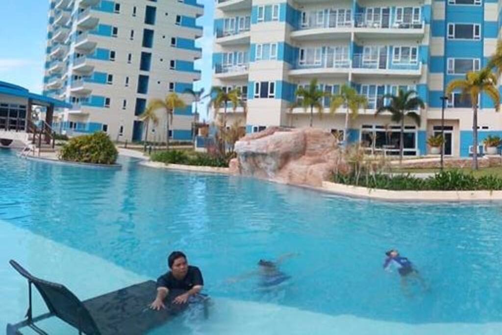 Have a dip at the large pool of Amisa