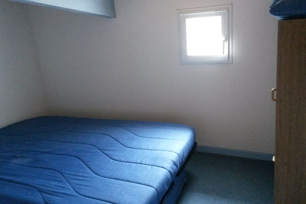 Chambre avec un canapé-lit 2 places