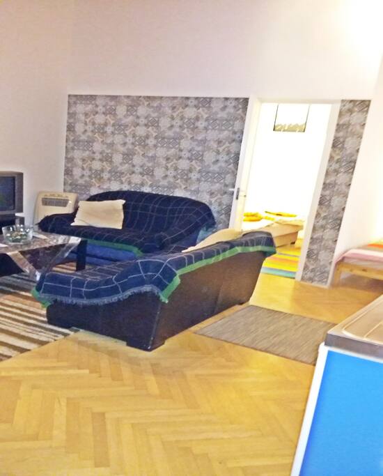 living room with smaller bedroom