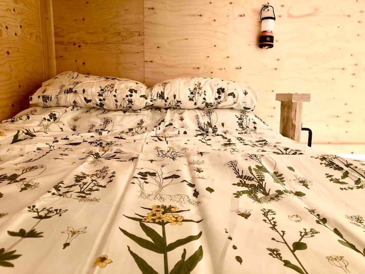 The loft’s double bed is plush, for a comfy nights sleep