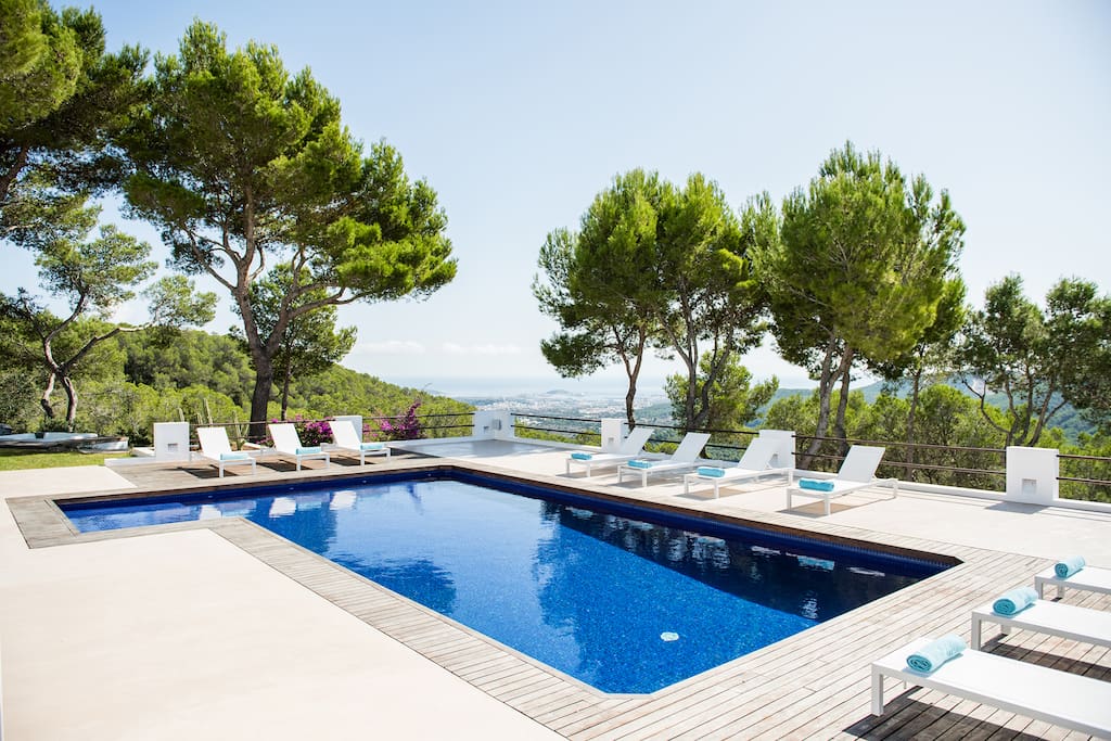 Pool view with sea view and of Ibiza town