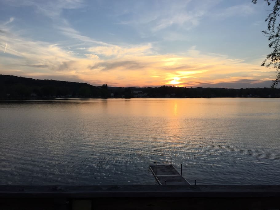 The sun sets right across the lake from our place!