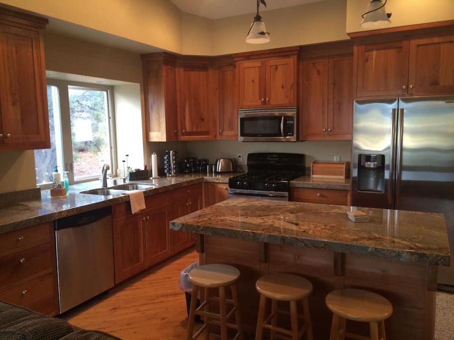 Kitchen with Cherry cupboards and granite counter tops