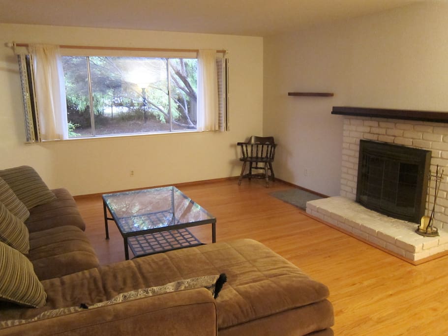 Family room with working fireplace.
