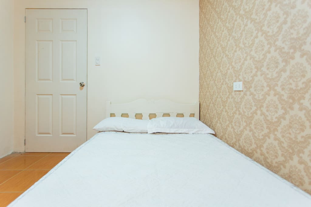 Simple but clean, comfortable bed.