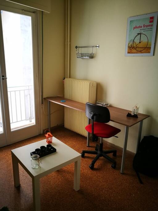 Big desk and office chair.