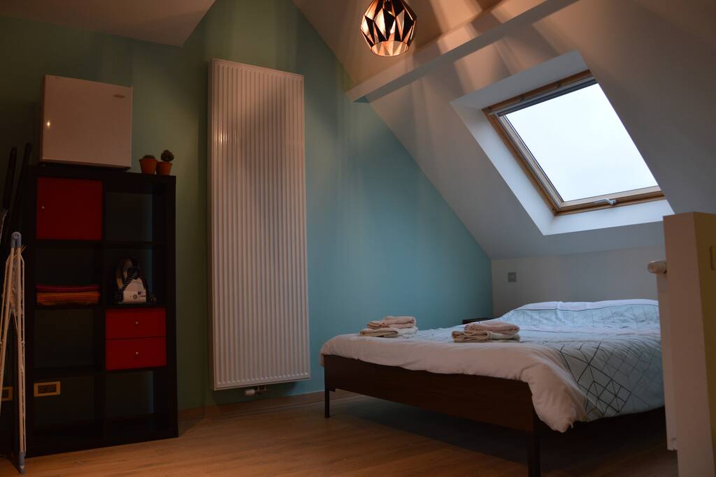 Room with comfortable double bed