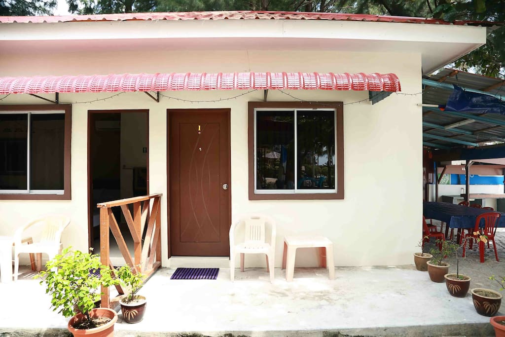 Chalet front door. Wheres the beach? well its beside you, like 10 second walk.
