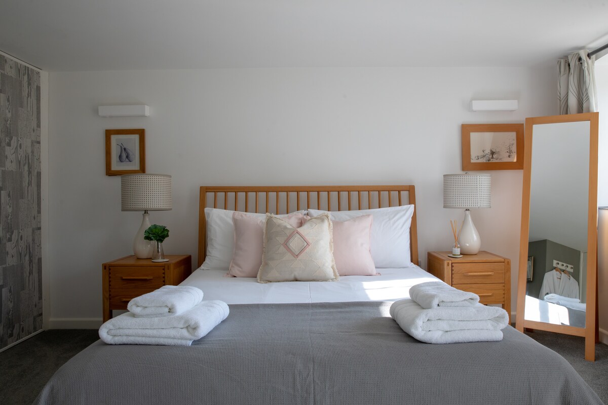 Spacious Master bedroom with King size bed.  