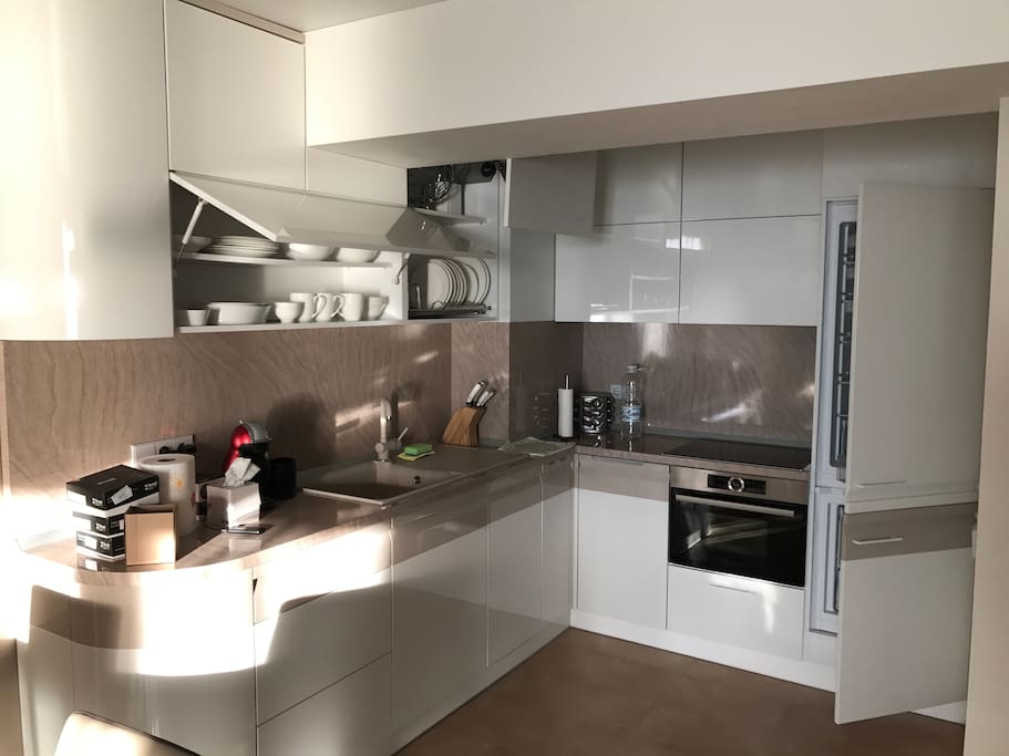 The open kitchen fully equipped for cooking