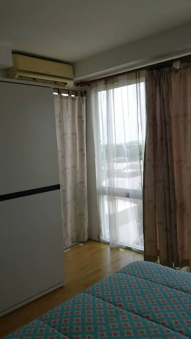 bedroom with 2 layers curtain