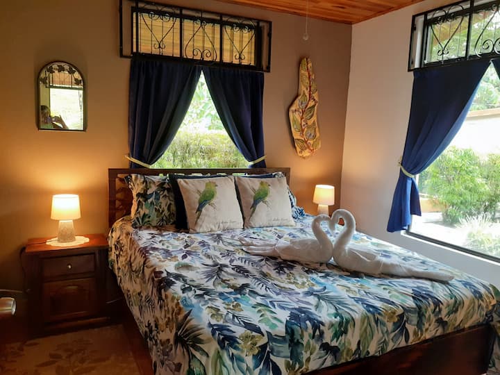 The Paradise Room
Queen Bed with Hand made Artisan Furnishings